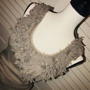 Taupe tank top with feather accent
